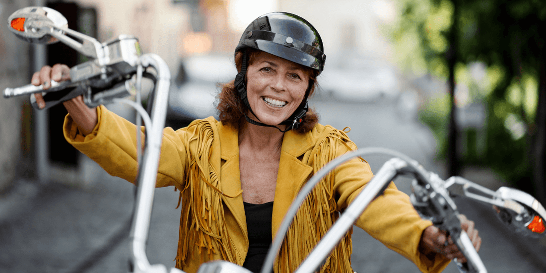 Midlife crisis woman on motorbike